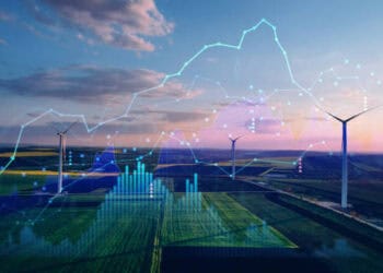 Wind turbines in a field with superimposed graphs showing growth. Renewable energy and supply chain implications. - Supply Chain News