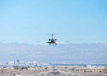 Private jet landing, approaching runway. Luxury travel. - Supply Chain News