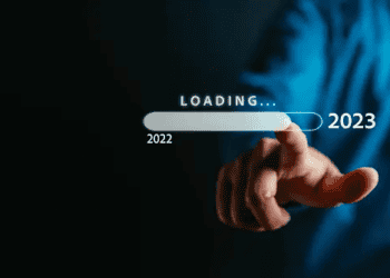 A man's hand is pointing to an ESG button.