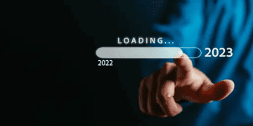 A man's hand is pointing to an ESG button.