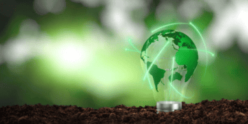 A light bulb with a green globe inside of it, symbolizing sustainability and emerging ESG trends.