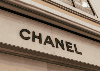 Chanel logo on the side of a building in Asian markets.