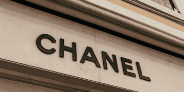 Chanel logo on the side of a building in Asian markets.