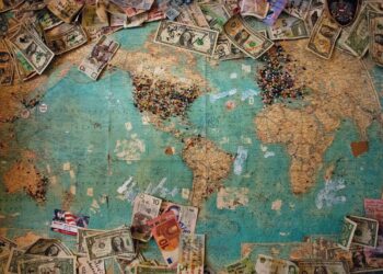 A controversial map of the world covered in money, sparking criticism and raising U.S. concerns about potential money laundering activities.