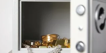 A luxurious safe box filled with precious jewelry and exquisite gold.