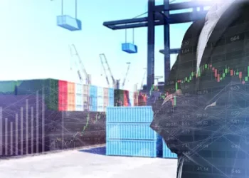 Cargo ship at port overlaid with stock market graph; illustrating global trade and logistics trends. - Supply Chain News