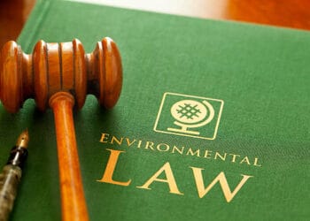 Gavel on Environmental Law book; investigating regulatory compliance. - Supply Chain News