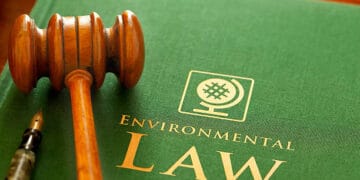 Gavel on Environmental Law book; investigating regulatory compliance. - Supply Chain News