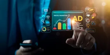 Businessperson interacts with digital marketing interface showing growth graph and "AD" for advertising. Digital marketing strategy. - Supply Chain News