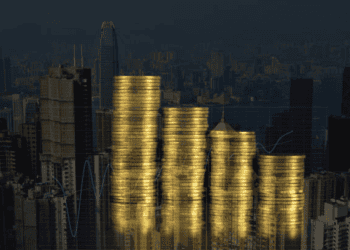 Gold coin stacks decreasing, city skyline background. Ethical gold sourcing. - Supply Chain News