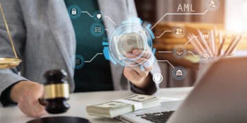 Judge examines cash, gavel and scales nearby; AML compliance and sanctions enforcement concept. - Supply Chain News