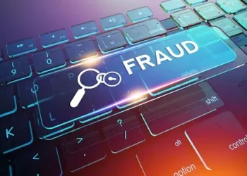 Keyboard with "Fraud" highlighted, magnifying glass and lock icon. Con Edison payment scam alert. - Supply Chain News