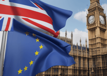 UK and EU flags fly before the Houses of Parliament, symbolizing the post-Brexit trade deal. - Supply Chain News