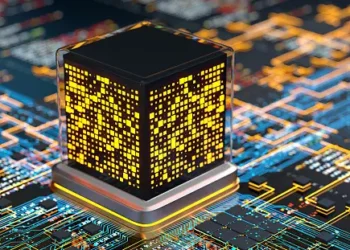 Quantum computer processor: glowing data cube on circuit board. Exploring quantum computing's cybersecurity implications. - Supply Chain News