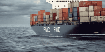 A large ship with containers on it, equipped with Ocean Carrier Data Collection technology.