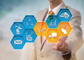 Businessman interacts with a digital interface showing supply chain management icons, including automation, logistics, and data analytics, enhancing import/export warehouse efficiency. - Supply Chain News