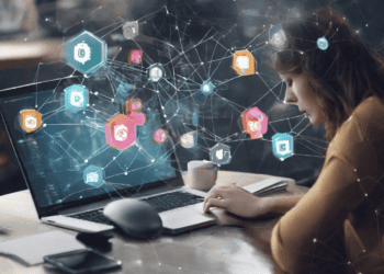 Woman working on laptop, blockchain technology interface displayed. Content authentication, AI. - Supply Chain News