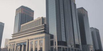 3D rendering of a large building in a city amidst the Evergrande Group's debt crisis.
