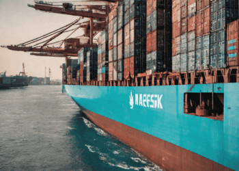 Large Maersk container ship at sea, showcasing blockchain technology's impact on global trade. - Supply Chain News