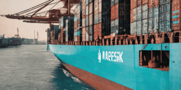 Large Maersk container ship at sea, showcasing blockchain technology's impact on global trade. - Supply Chain News