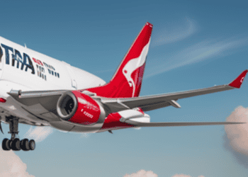 A Qantas plane flying in the sky.