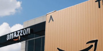 A box with an Amazon logo in front of a building involved in an Anti-Trust Lawsuit.