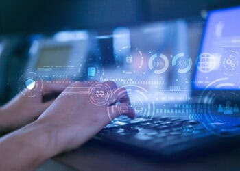 Hands typing on keyboard, data security and export control icons overlayed. US Department of Commerce. - Supply Chain News