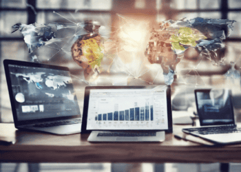 Three laptops display global data, illustrating technology's impact on the global economy. - Supply Chain News