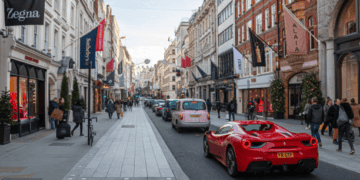 A red Ferrari car on Bond Street, London.