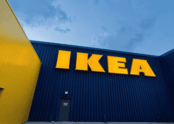 IKEA store exterior with large yellow logo on a blue wall. - Supply Chain News