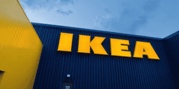 IKEA store exterior with large yellow logo on a blue wall. - Supply Chain News