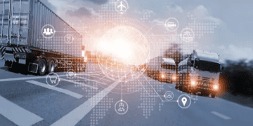 Trucks on highway with digital logistics network overlay. Suttons International and LogChain partnership. - Supply Chain News