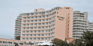 Beverly Hills Hotel exterior shot. Peach-colored building with balconies. - Supply Chain News