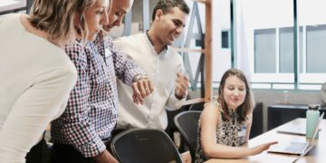 Team of professionals collaborating on biometric identity and e-KYC technology. Indonesia-UAE partnership. - Supply Chain News