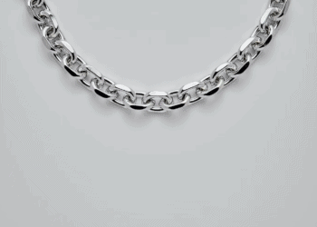 A silver chain necklace from Yuga Labs on a white background.