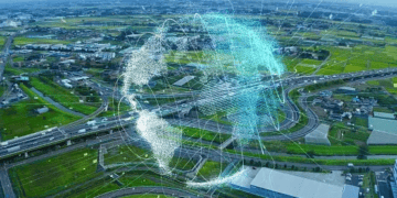 Aerial view of a global network overlaying a green supply chain infrastructure. Sustainable logistics. - Supply Chain News