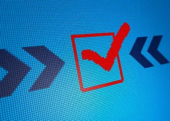 An image of a check mark on a computer screen showcasing the Huawei International Data Protection Trustmark Certification.