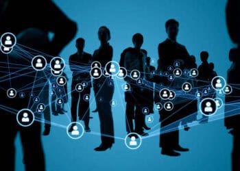 A group of people standing in front of a network of people, highlighting the Niger Coup and its impact on local populations and broader global issues.