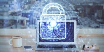 Laptop displaying a digital padlock graphic, symbolizing cybersecurity and zero trust. - Supply Chain News