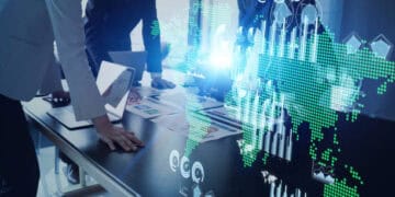 Businesspeople collaborate on a table, analyzing global trade data visualized as a world map with charts and graphs. Biden's import restrictions on Russia impact is implied. - Supply Chain News