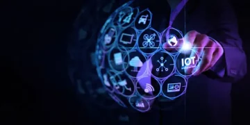 An image of a businessman engaged in a digital transformation, touching an icon on a screen.