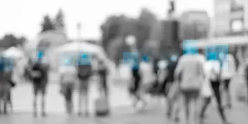 Blurred crowd of people, facial recognition boxes highlight individuals. Concerns over facial recognition in Myanmar. - Supply Chain News