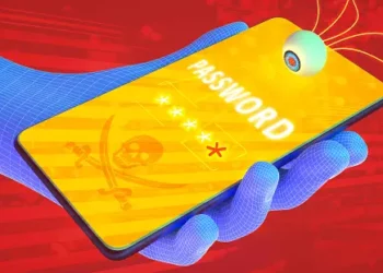 Wireframe hand holding phone displaying a password entry screen with a skull and crossbones; Pegasus spyware concerns. - Supply Chain News