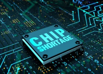 A Motorola chip with the word chip storage on top of a circuit board, amidst the semiconductor shortages, leading to increased costs.