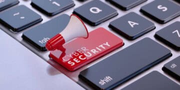 Red Cyber Security button on keyboard with megaphone; securing supply chains. - Supply Chain News