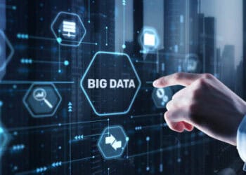 Hand interacting with a digital interface showing "Big Data" and related icons. - Supply Chain News