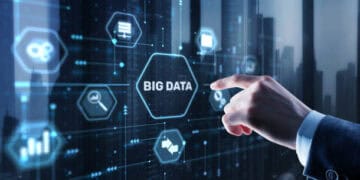 Hand interacting with a digital interface showing "Big Data" and related icons. - Supply Chain News