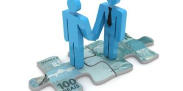 Two people from different countries symbolizing international cooperation, holding hands on a puzzle piece representing regional development at the Eastern Economic Forum.