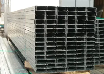 Stacked galvanized steel framing channels for construction. - Supply Chain News