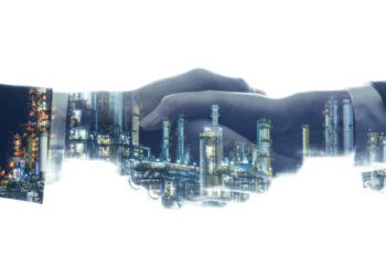 Handshake overlaid with image of Pakistan's industrial infrastructure, symbolizing geo-economic growth and regional connectivity. - Supply Chain News